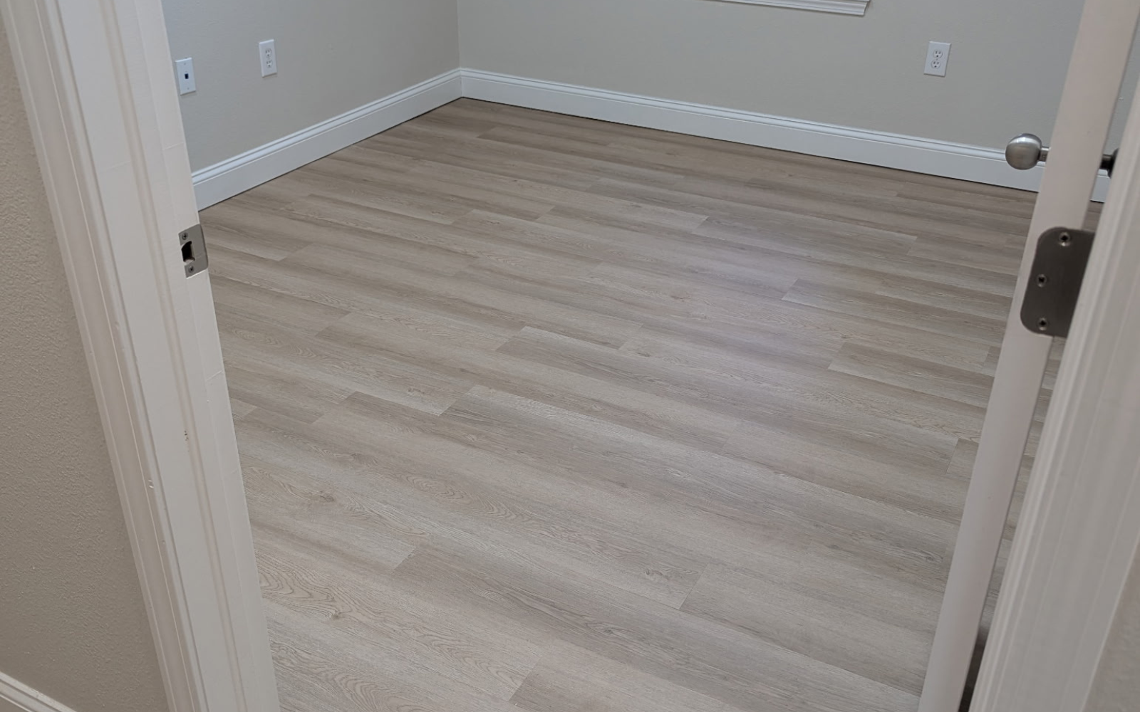 Laminate flooring installation in Lakeland FL home by Galloway Carpet One Floor & Home