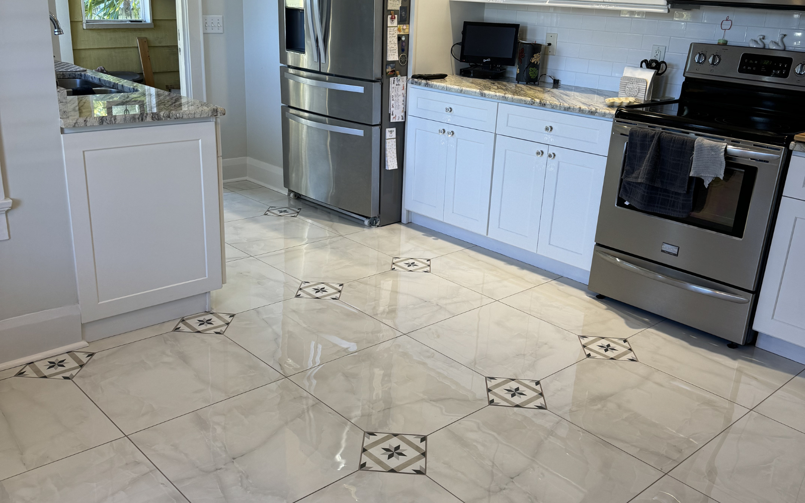 Professional flooring installers in Lakeland FL working on home renovation by Galloway Carpet One